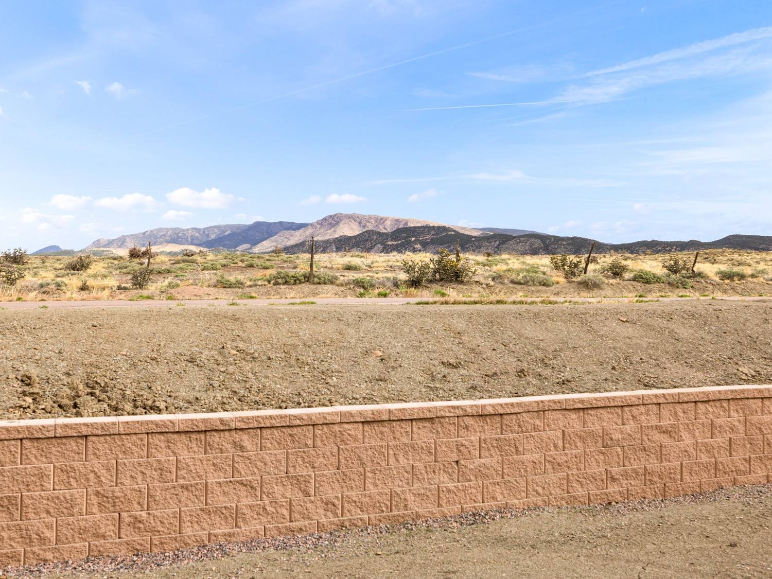 Open ground and ridgeline seen from the rear of the property